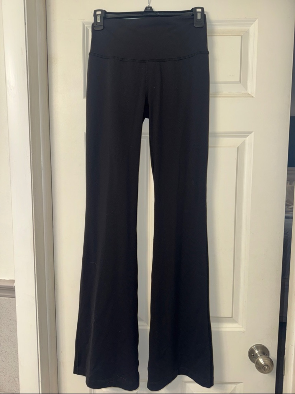 Lululemon Flared Leggings like new! Solid black. Hardly worn!